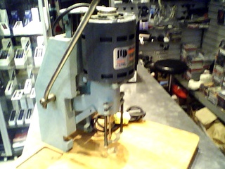 Paper drilling machine