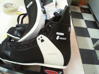 Paire de patin a glace size 8y
