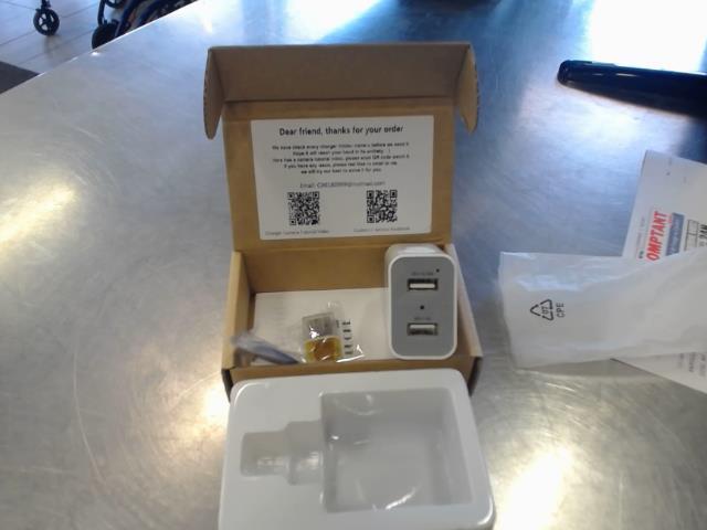 Camera cache dans chargeur