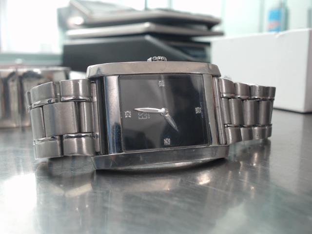 Montre esq 4 diamants