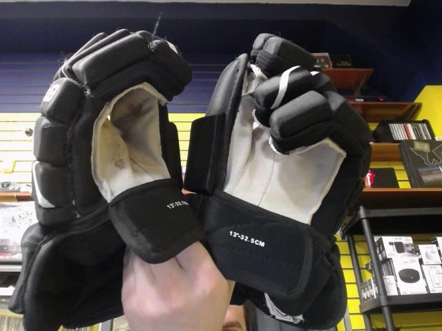 Pre de gants hockey presque neuf