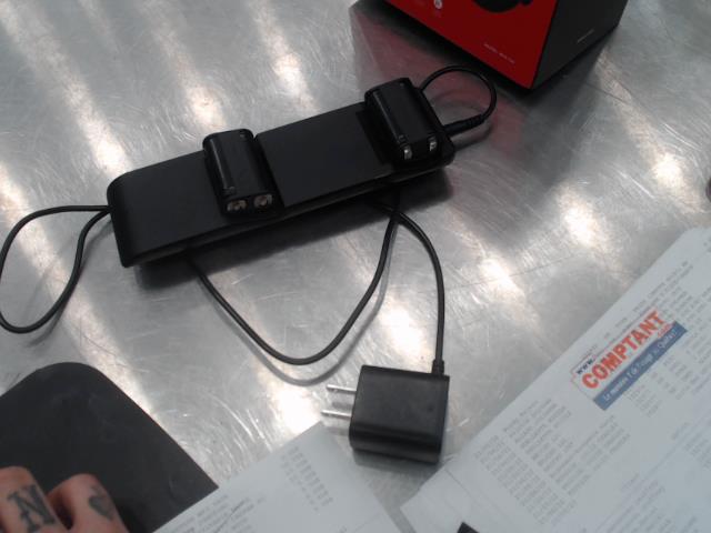 Ultra slim controller charging station