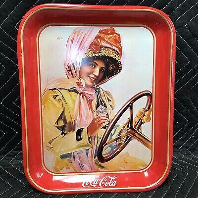 Girl driviing with steering wheel large