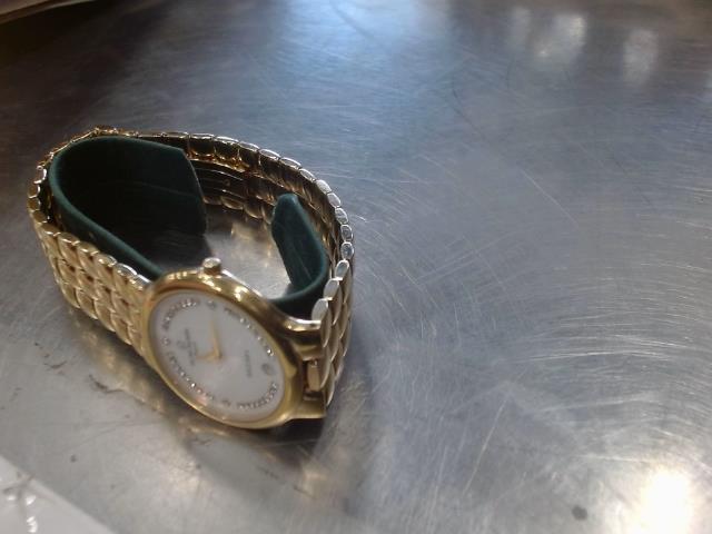 Montre michel herbelin couleur gold