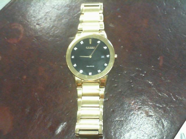 Montre eco drive couleur or