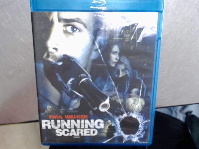 Runing scared (traquÉ)