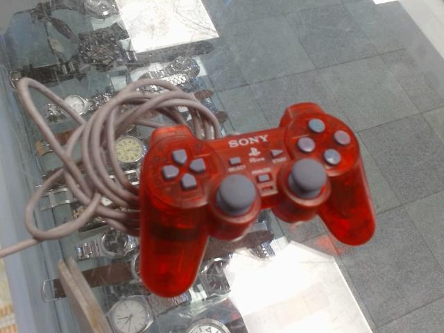 Manette de ps1 transparent rouge