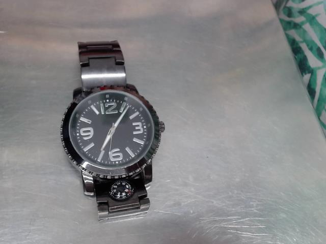 Black watch with boussol under