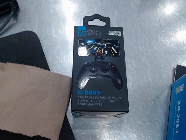 Support de telephone pour manette