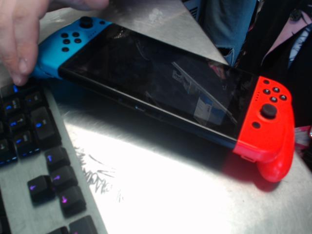 Console nintendo switch + chargeur