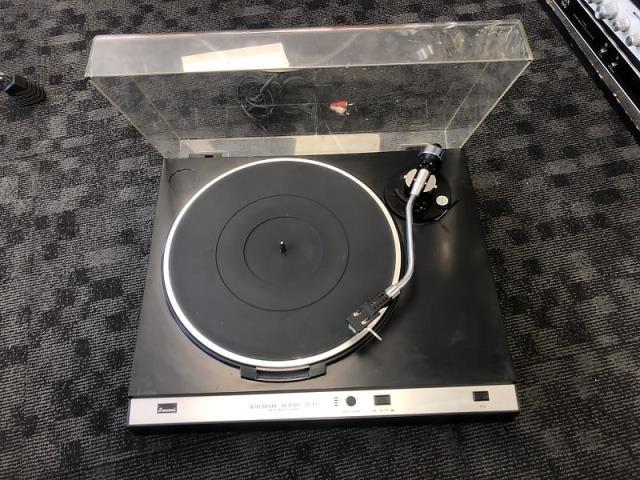 Automatic return direct drive turntable