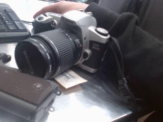 Camera 35mm+lentille dans sac