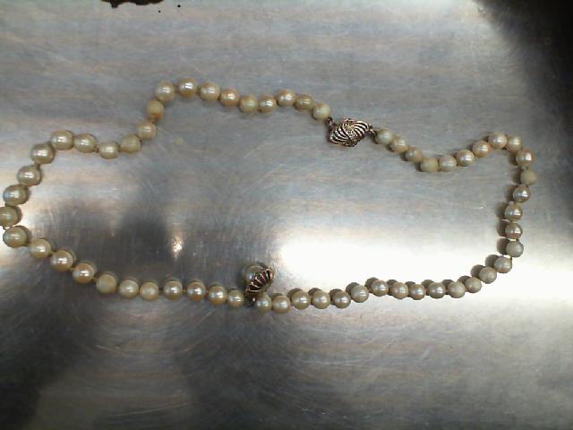 Collier de perle chere (dja amner)