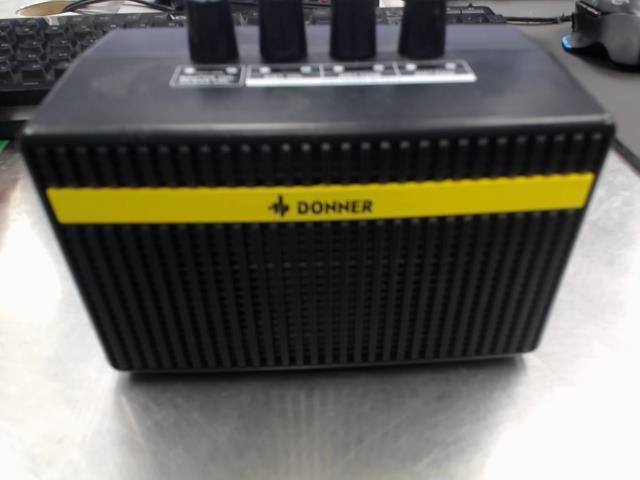 Amplificateur donner noir stripe jaune