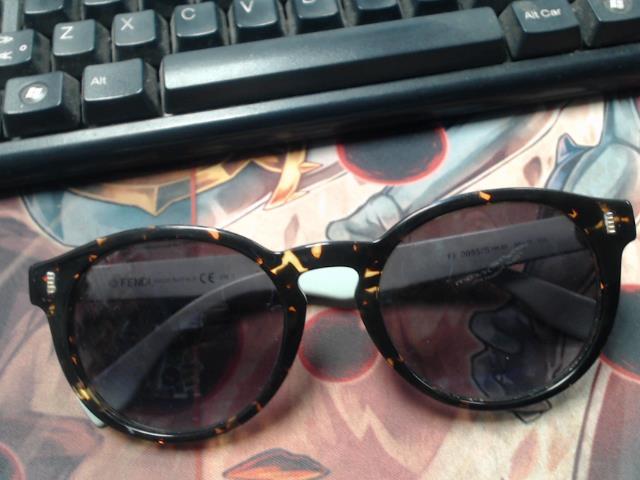 Lunette dans case rayban