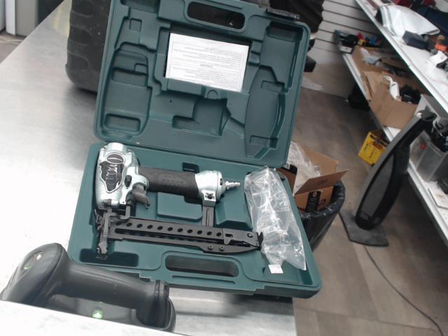 New stapler, in green hard case