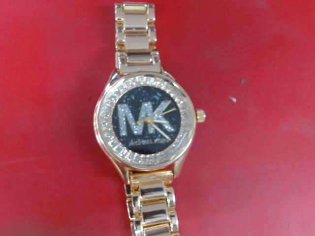 Montre michael kors dore et noire