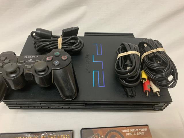 Playstation 2 noir avec manette + 4 jeux