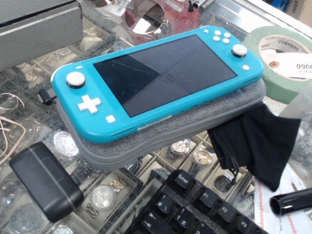 Switch lite + case + charg