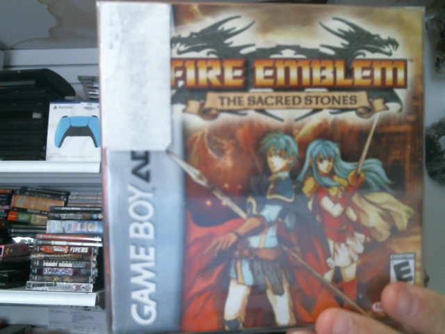 Fire emblem + livre + boite super etat