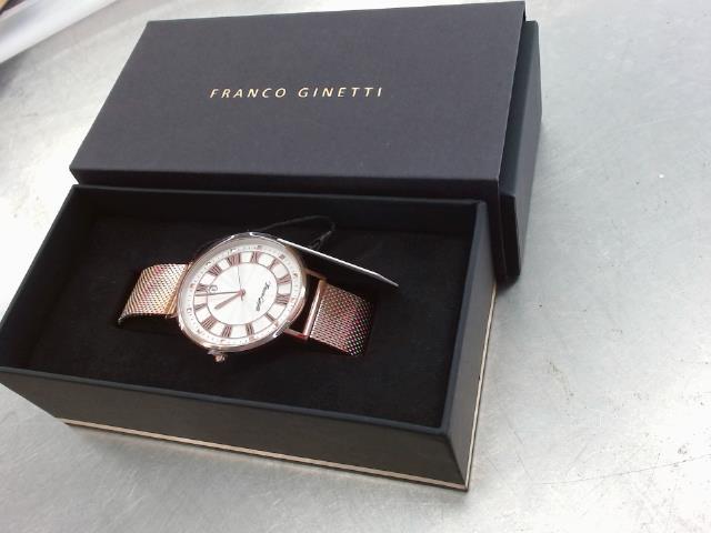 Montre cadran blanc et mailles bronze