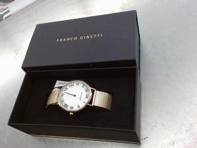 Montre cadran blanc mailles en or