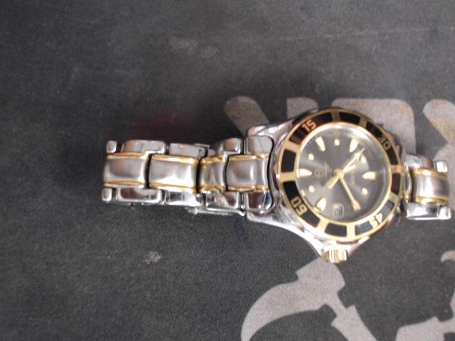 Montre simon chang dore pour femme