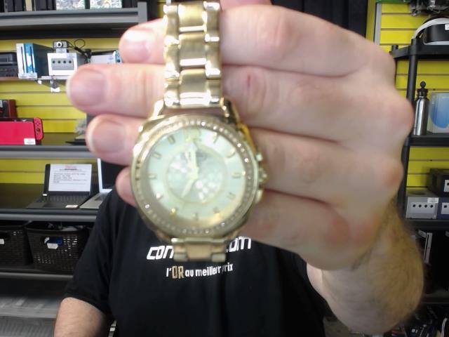 Montre stainless gold tone