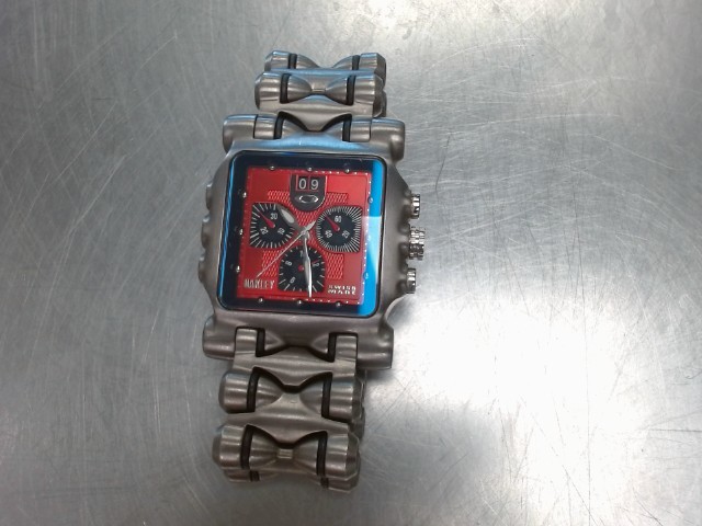 Montre homme oakley minute machine