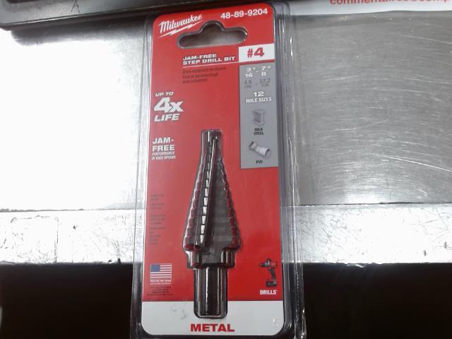 Jam-free step drill bit