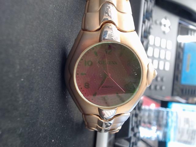 Montre geneva or triangle
