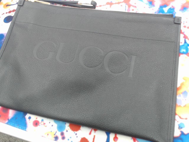 Grosse pochette gucci noire +sac