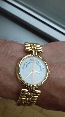 Montre dore cadran blanc