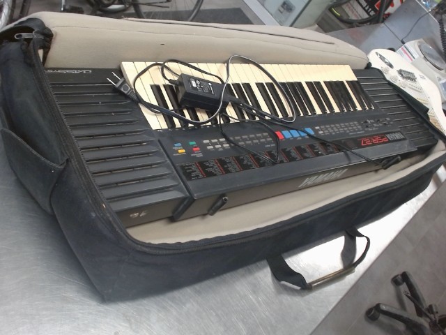Clavier musique jauni in vase noire