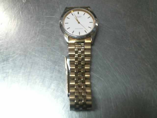 Montre quartz gold tone