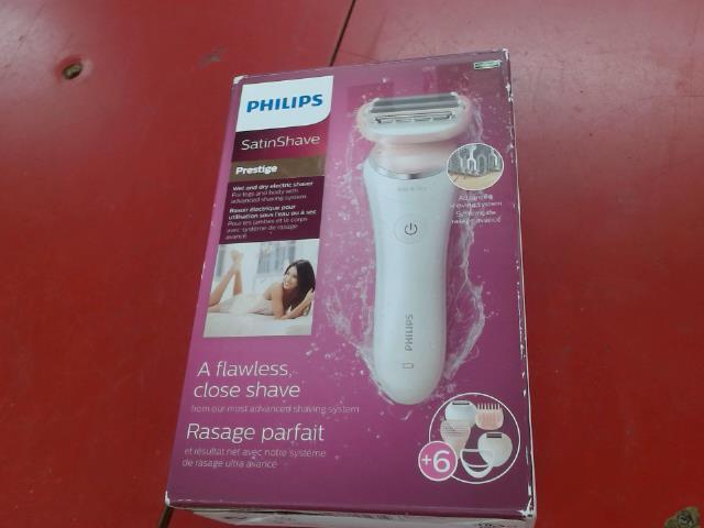 Rasoir electrique neuf pour femme