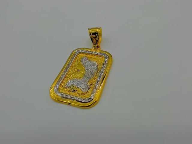 BRELOQUE EN OR 10KT NEW