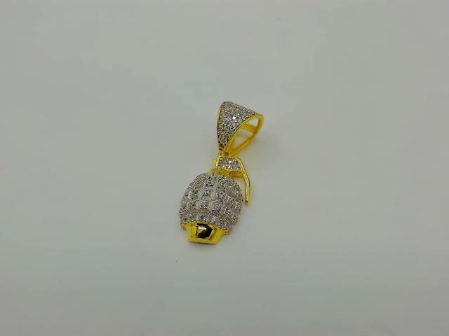 BRELOQUE EN OR 10KT NEW 