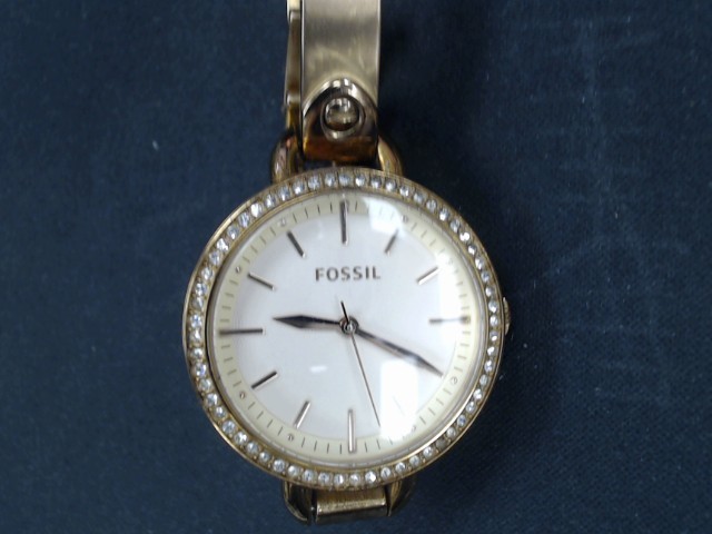 Montre dore avec pierres