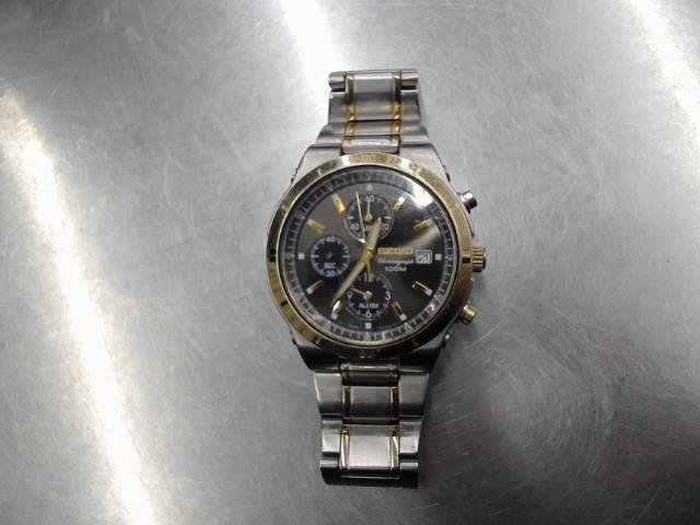Montre seiko chrono argent et or