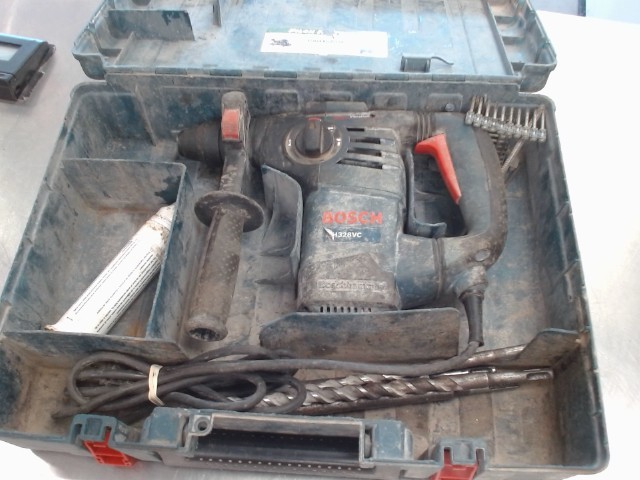 Rotary hammer dans case