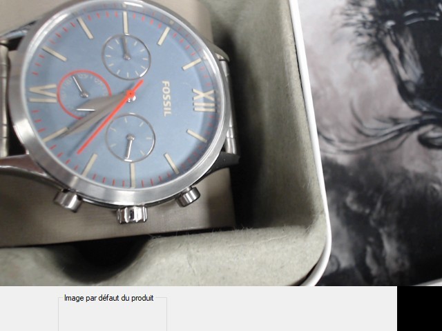 Montre fossil gris fond bleu