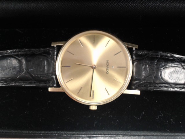Vintage quartz 14kt gold watch