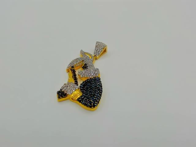BRELOQUE EN OR 10KT NEW 