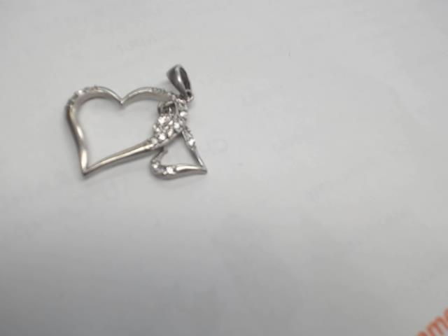 Bague en argent design coeur avc pierre