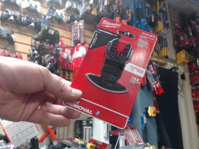 Grout blade