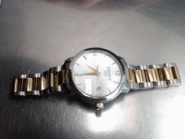 Montre tissot femme gold tone