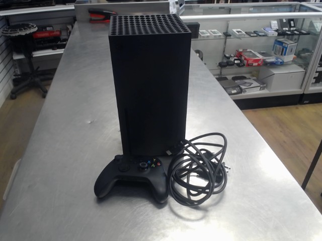 Xbox serie x avec man+fil