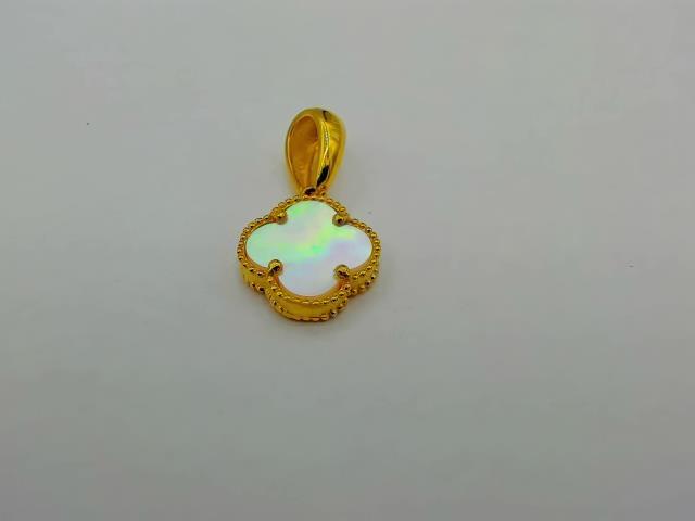 BRELOQUE EN OR 10KT NEW