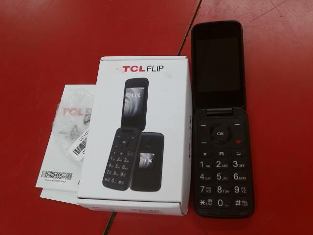 Cell flip phone+chargeur+boite